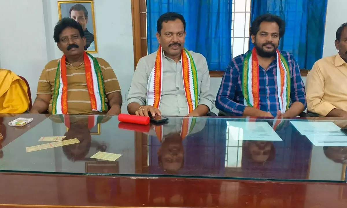 YSR district Congress president Gundlakunta Sriramulu and others addressing a media conference in Kadapa on Tuesday