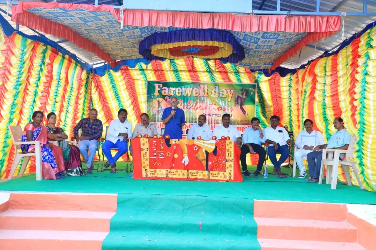 Chinnakeshampalle Zilla Parishad High School Telugu teachers distribute educational materials to class X students