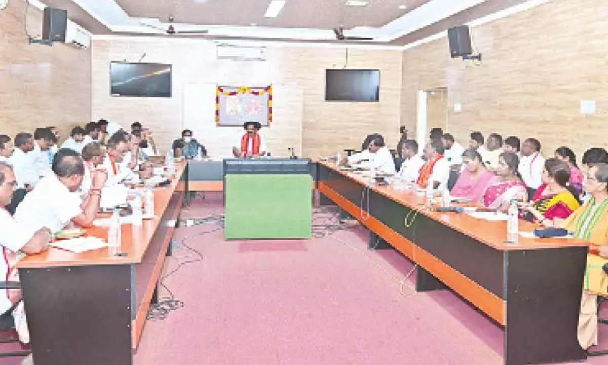 Srisailam temple EO D Peddiraju addressing a meeting on Ugadi Mahotsavam in Srisailam on Thursday