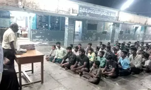 Shanthi Seva Society distributes pen and pads to hostel students