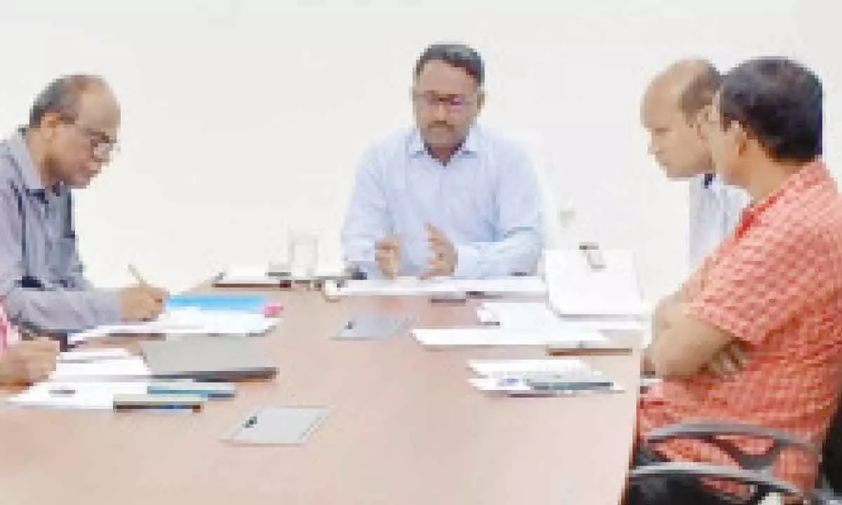 Commissioner of School Education S Suresh Kumar reviewing arrangements for SSC Public Examinations at SSC Board office in Tadepalli on Sunday. Director of Government Examinations  D Devananda Reddy is also seen.