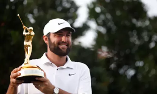 Scheffler overcomes pain in the neck to defend Players title as Theegala record top-10 finish