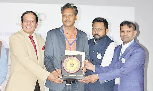 GIET School of Pharmacy NSS programme officer Shaik Meera receiving the GYPC Excellence, Community Builder Award- 2024