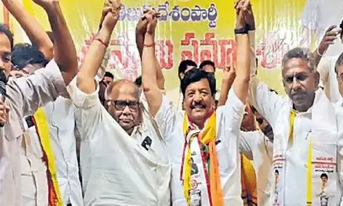 JSP candidate Kandula Durgesh, TDP in-charge Boorugpalli Sesha Raoand others participating in a joint meeting in Nidadavolu