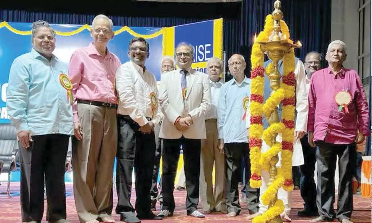 Indian Overseas Bank MD and CEO Ajay Kumar Srivastava, National Confederation of Bank Employees (NCBE) president R Balaji, All India Bank Pensioners and Retirees Confederation (AIBPARC) president KV Acharya and others lighting the traditional lamp at the ARISE general body conference organised at Chennai on Tuesday