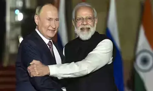 Talks solution to Ukrain conflict: PM to Putin