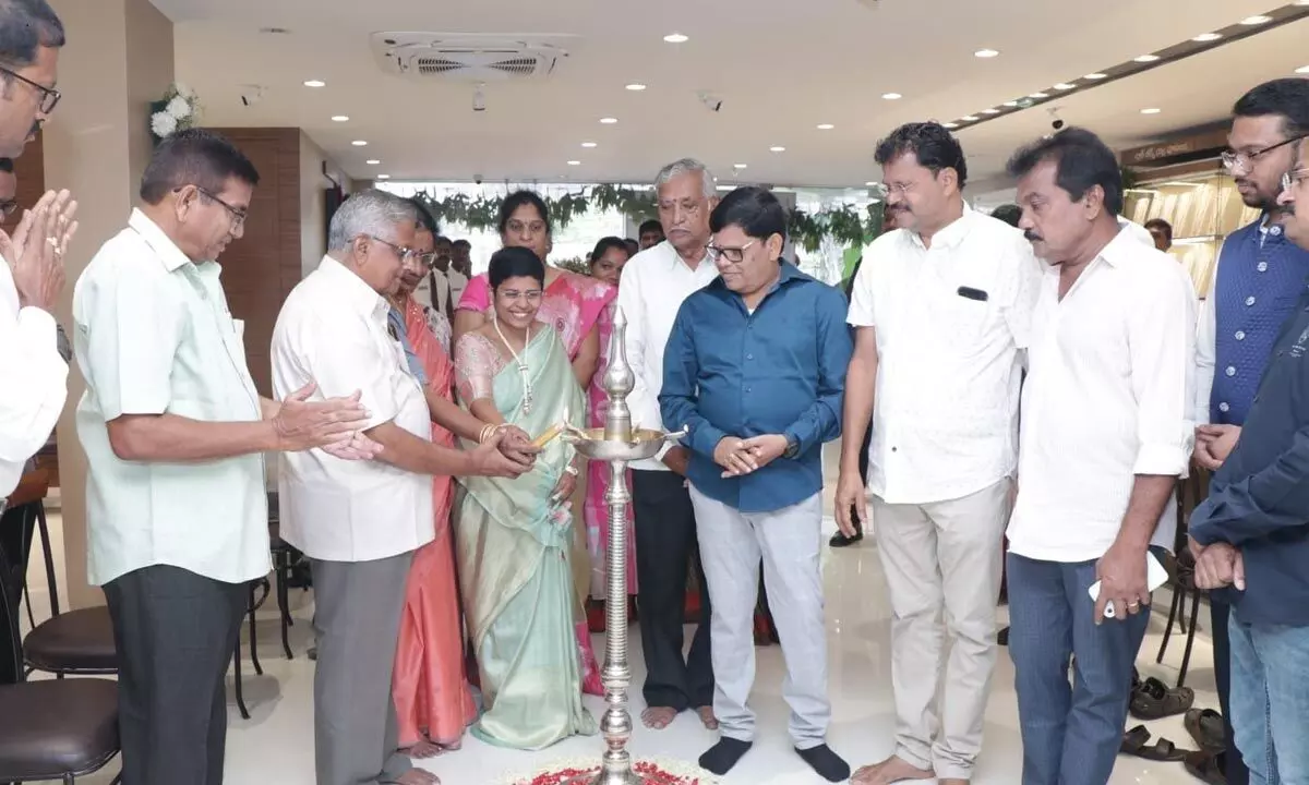 Vaibhav Jewellers management along with the invitees inaugurating the 15th showroom in Mancherial on Sunday