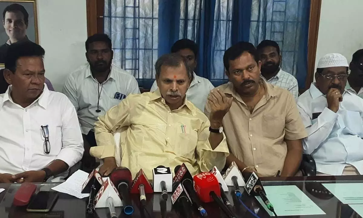 AP Media committee president Dr N Tulasi Reddy addressing a press conference at party office in Kadapa on Sunday