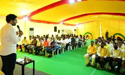 TDP national general secretary Nara Lokesh addressing representatives of the Auto Workers Union at his residence at Undavalli on Sunday