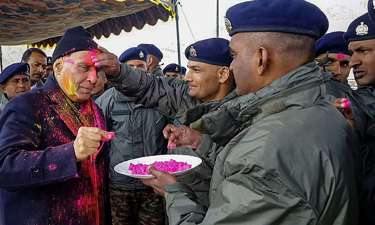 Defence Minister Rajnath Singh celebrates Holi festival with Armed Forces personnel, in Leh on Sunday