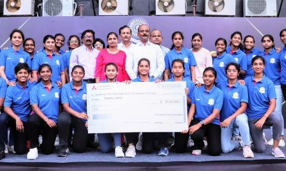 Representatives of ACA handing over Rs 20 lakh to the ACA Women’s team members at the PM Palem stadium in Visakhapatnam