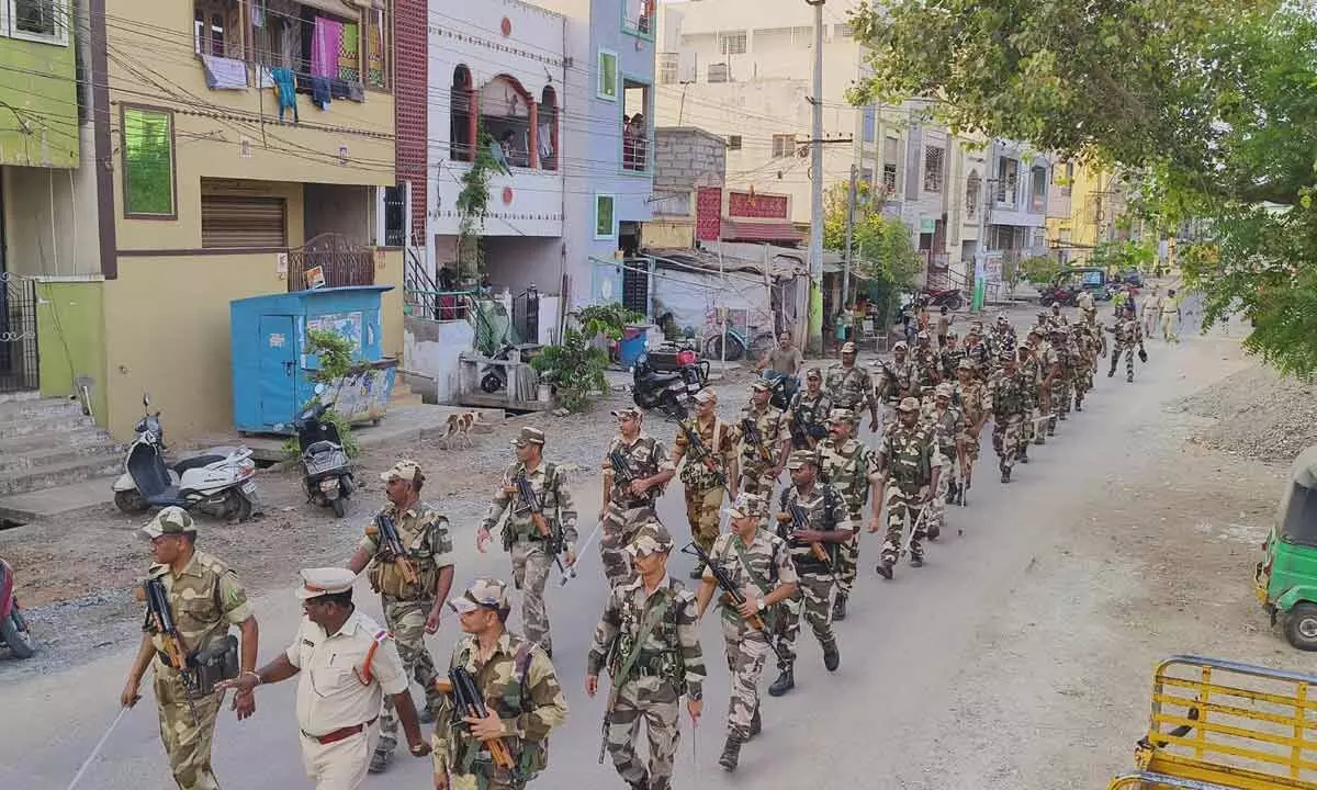 Vijayawada: Police conduct flag march to infuse confidence in voters