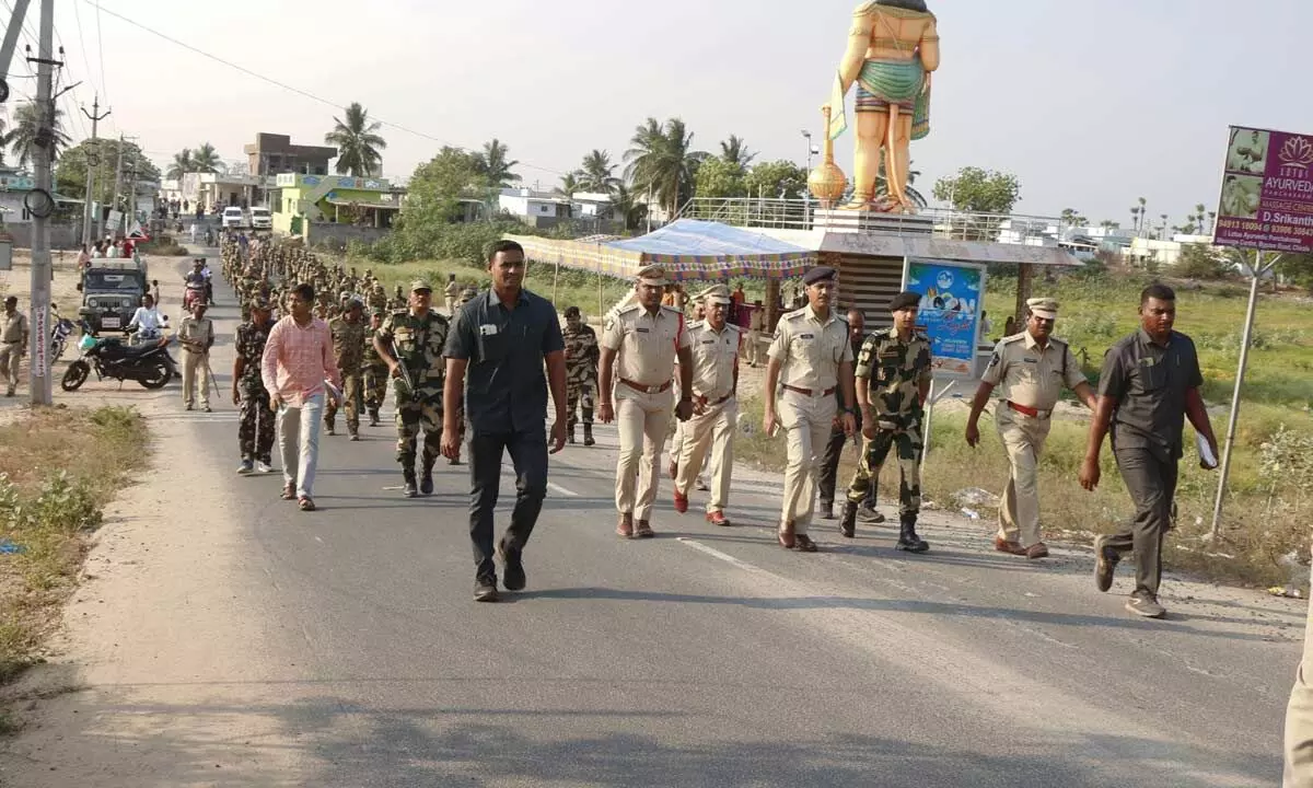 Bapatla SP Vakul Jindal participating in the march past in Ramapuram and Katarivaripalem on Tuesday