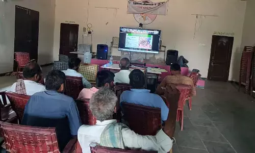 Scientists who made the farmers aware about the use of drones in the farming community