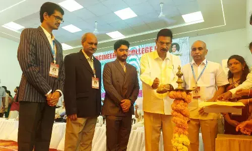 Mizoram Governor Kambhampati Haribabu and others lighting the lamp in Bhimavaram on Tuesday