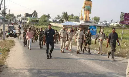 Bapatla SP Vakul Jindal participating in the march past in Ramapuram and Katarivaripalem on Tuesday