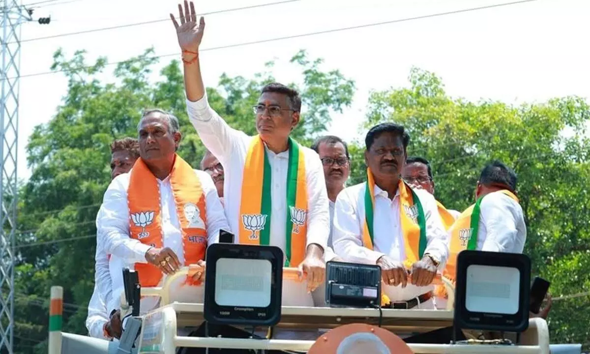 BJP MP candidate Tandra Vinod Rao participating in a rally in Kothagduem on Thursday