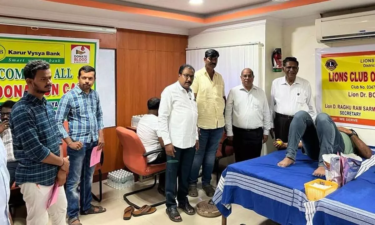 The staff of Karur Vysya Bank donating blood in Vijayawada on Friday