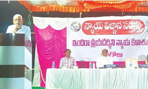 Secretary and correspondent of Indira Priyadarsini Law College in Ongole C V Ramakrishna Rao speaking at Legal Knowledge Camp in B Nidamanuru of NG Padu mandal on Thursday