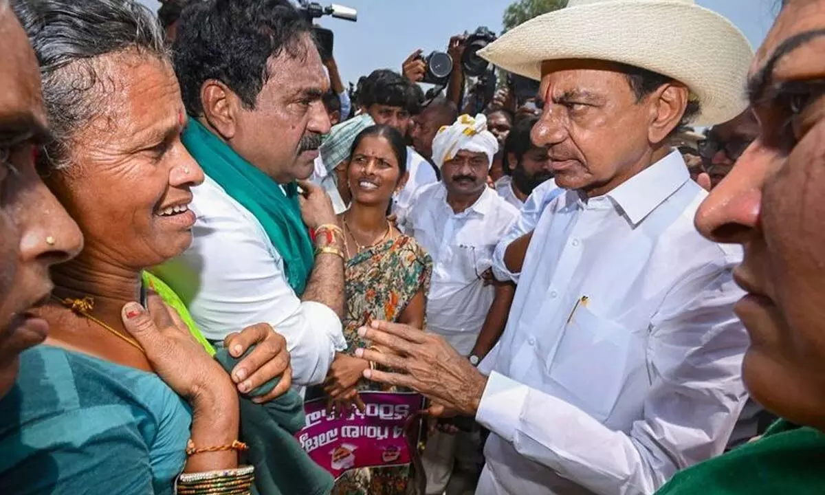 BRS president K Chandrashekar Rao interacts with farmers  during a visit to Dharawat Tanda in Janagaon district on Sunday Photo: G Shyam Kumar