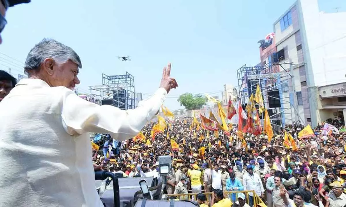 TDP national president N Chandrababu Naidu flashing victory sign during the ‘Praja Galam’  public meeting in Yemmiganur in Kurnool district on Sunday