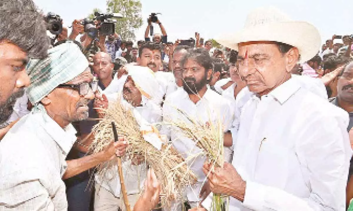 BRS president K Chandrashekar Rao interacts with farmers  during a visit to Dharawat Tanda in Janagaon district on Sunday Photo: G Shyam Kumar