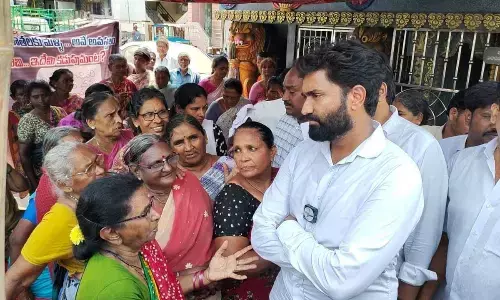 YSRCP Rajahmundry city MLA candidate Margani Bharat Ram talking to pensioners in Rajahmundry on Monday