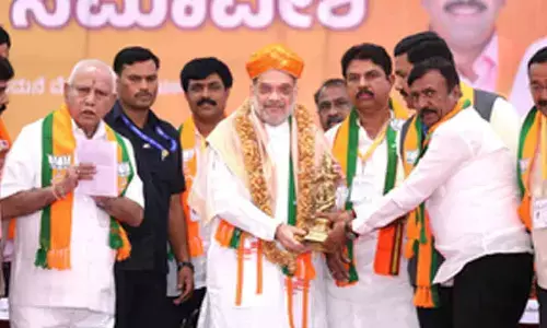 Ktaka CM saving his chair which Dy CM is trying to snatch: Amit Shah