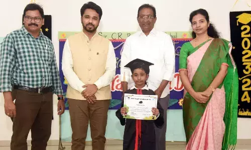 Collector V Prasanna Venkatesh and his daughter Rashmi  Sahasra Anvita with school management