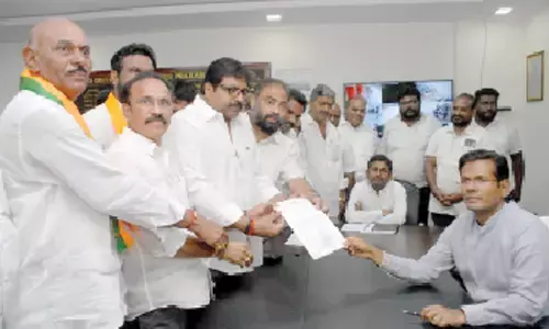 TDP, BJP and JSP leaders submitting a representation to start distribution of pensions to collector A S Dinesh at the collectorate in Ongole on Tuesday