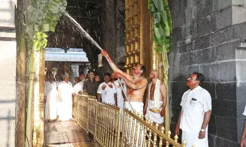 TTD Chairman Bhumana Karunakar Reddy and EO A V Dharma Reddy taking part in Koil Alwar Tirumanjanam at Tirumala on Tuesday