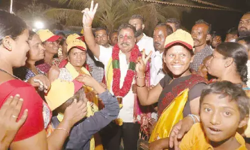 Amilineni Surendra Babu carrying out campaign in Kambaduru mandal on Thursday