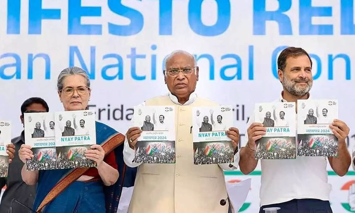 Congress president Mallikarjun Kharge with senior party leaders Sonia Gandhi and Rahul Gandhi releases the partys manifesto ahead of Lok Sabha elections, in New Delhi on Friday