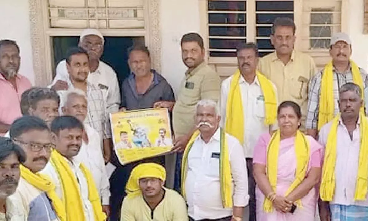 Local TDP leaders during a door-to-door campaign in Kuppam on Monday