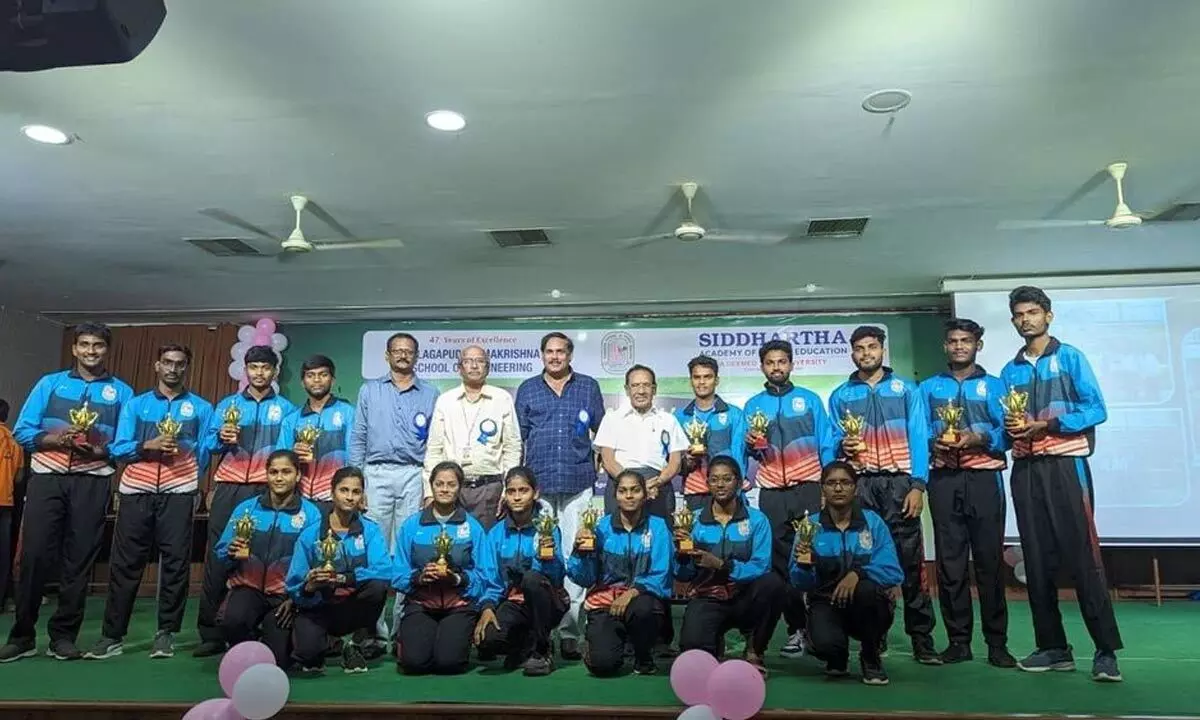 Dr Chadalavada Nageswara Rao, Siddhartha Academy chairman, Nadella Brahmaji Rao and principal AV Ratna Prasad with the students who excelled in sports at VR Siddhartha Engineering College in Vijayawada on Monday