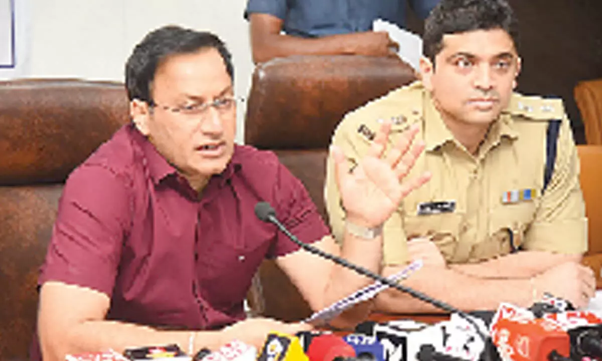 Collector and DEO Pravin Kumar speaking to the media in Tirupati on Monday. SP Krishna Kanth Patel is also seen