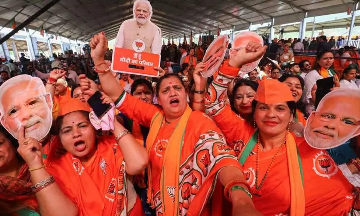 BJP supporters during a public meeting of Prime Minister Narendra Modi at Udhampur in Jammu-Kashmir on Friday