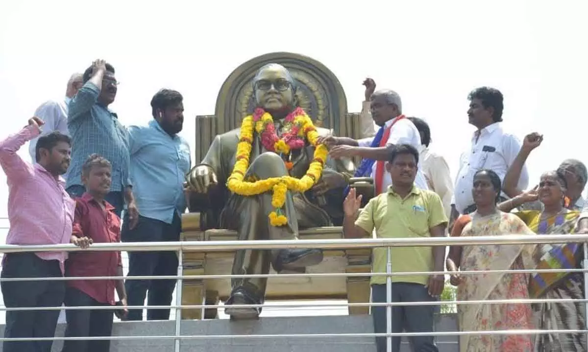 CPM Central Assembly segment contestant Ch Babu Rao paying tributes to Babasaheb Ambedkar in Vijayawada on Sunday