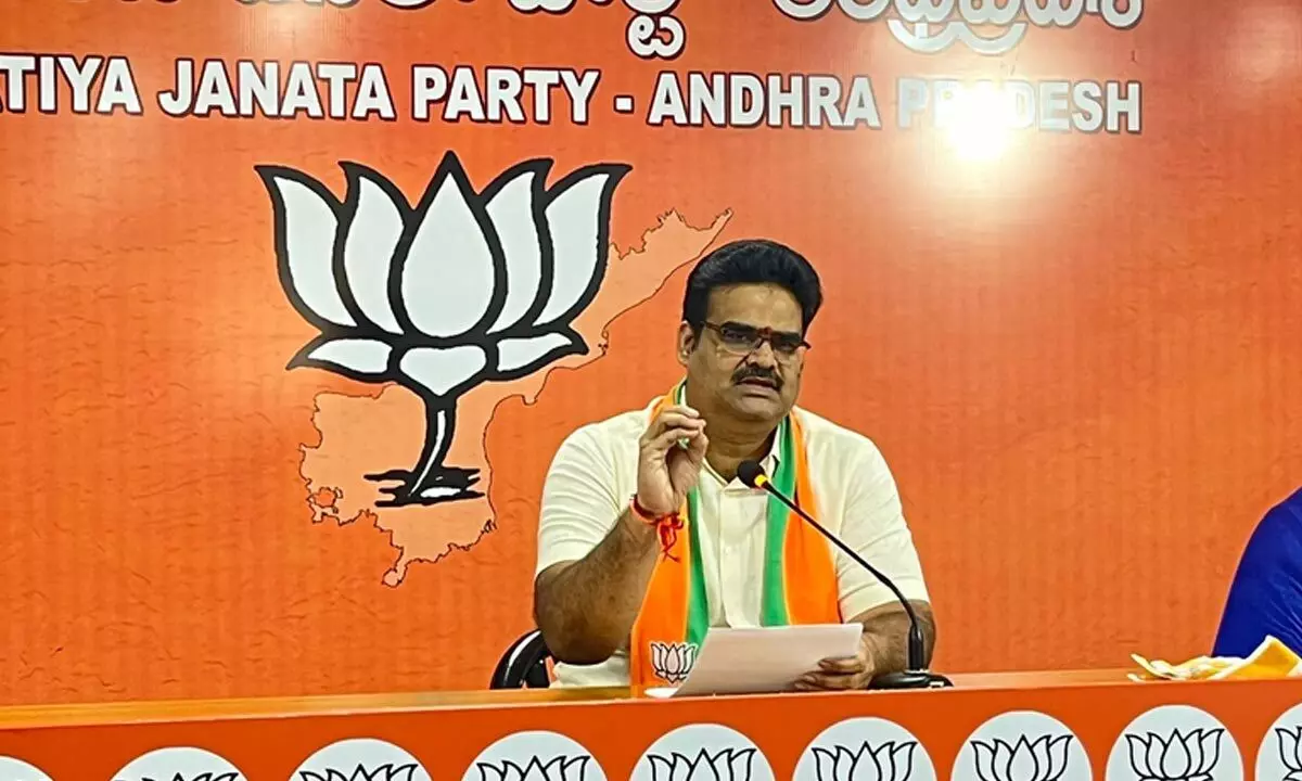 BJP state official spokesperson Lanka Dinakar addressing a press conference at party state office in Vijayawada on Tuesday