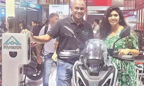 AVERA CEO Dr Venkata ramana and Company COO Chandini Chandana displaying Avera EV charging station at Canton Fair in China