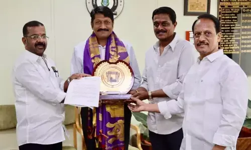 Warangal West MLA Naini Rajender Reddy submitting a memorandum to Railway DRM Bhartesh Kumar Jain in Secunderabad on Tuesday