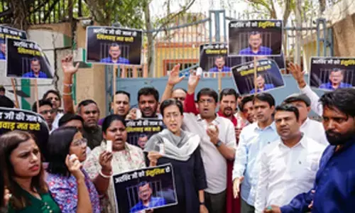 Atishi, AAP workers carrying insulin gather outside Tihar Jail