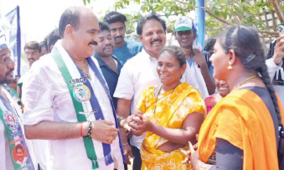 YSRCP Ongole MLA candidate Balineni Srinivasa Reddy interacting with locals in campaign in Ongole on Sunday