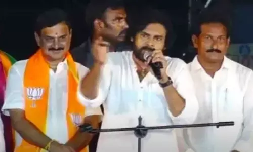 Jana Sena president Pawan Kalyan addressing a public meeting in Narasapuram in West Godavari district on Sunday