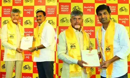 TDP leader Kesineni Chinni receiving B-Form from N Chandrababu Naidu on Sunday; MP and TDP candidate for Narasaraopet Lok Sabha constituency Lavu Sri Krishnadevarayalu receiving B-Form from TDP national president N Chandrababu Naidu at the TDP state party office at Mangalagiri on Sunday