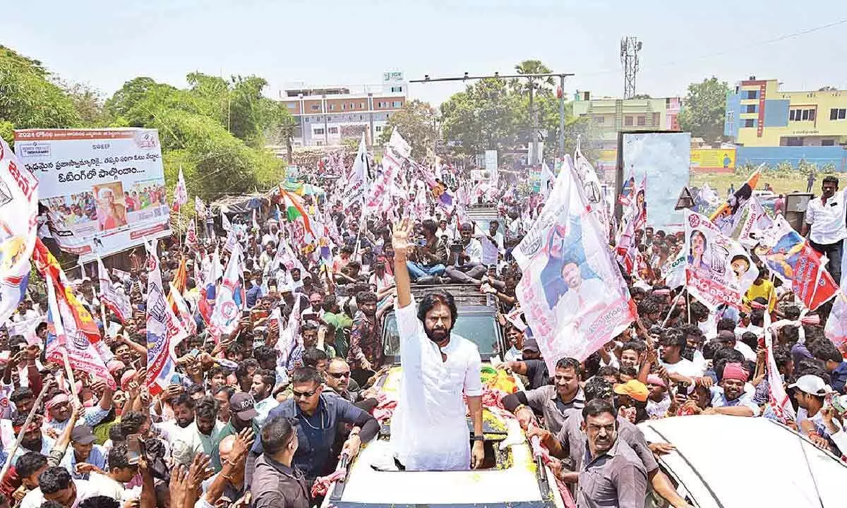 Pawan Kalyan takes part in a rally while going to file his nomination on Tuesday