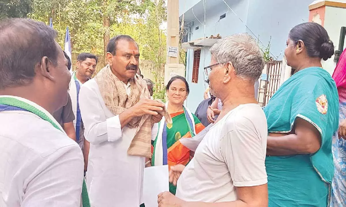 MLA Bhumana Karunakar Reddy conducting house-to-house campaign in Tirupati on Tuesday