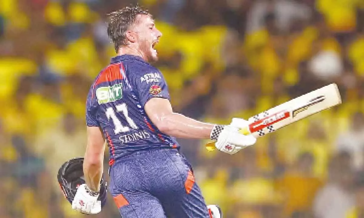 Marcus Stoinis reacts after scoring his maiden IPL century