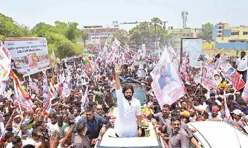 Pawan Kalyan takes part in a rally while going to file his nomination on Tuesday