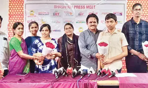 Management of Bhashyam High School in Ongole appreciating students who scored highest marks in SSC results